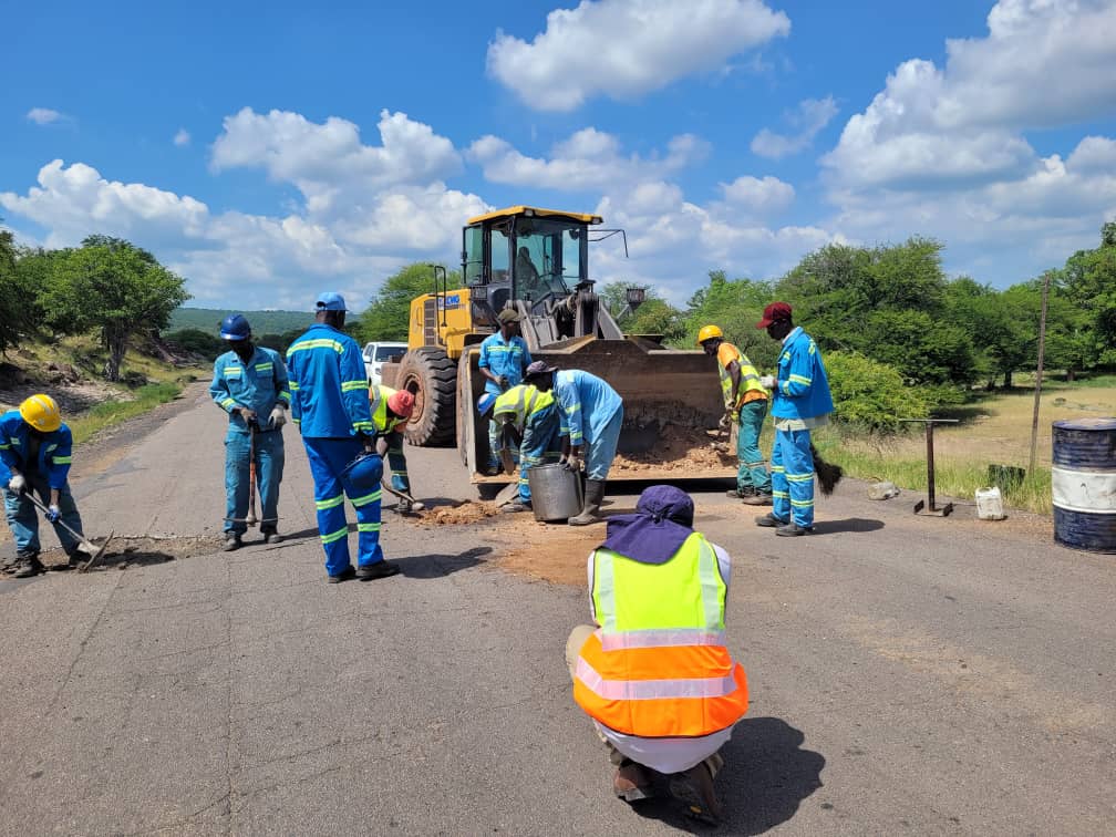 Dinsion Iron and Steel Team fixing manhize roads